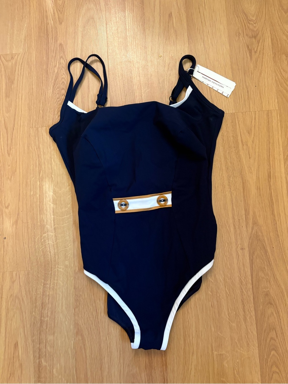 Navy One-Piece Swimsuit with White Trim and Decorative Front Tab